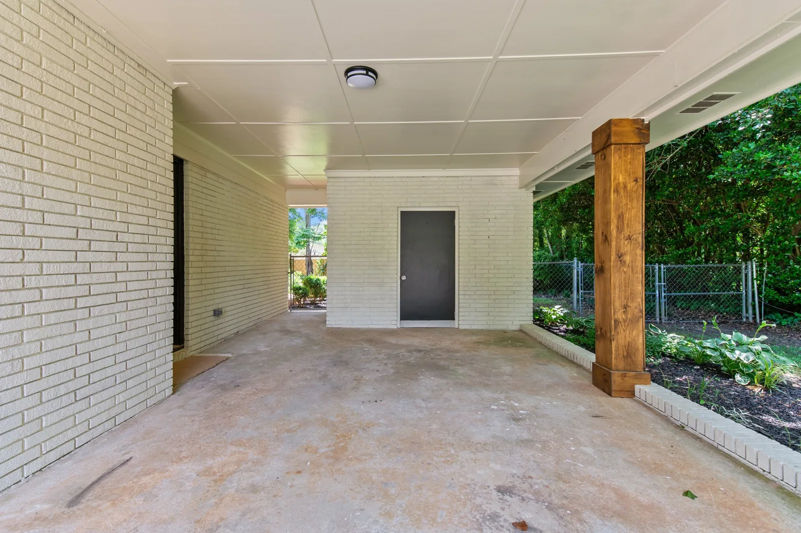 Roxanne: covered entry with wood posts
